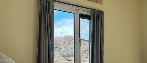 Room, Lanai, Garden View | Blackout curtains, iron/ironing board