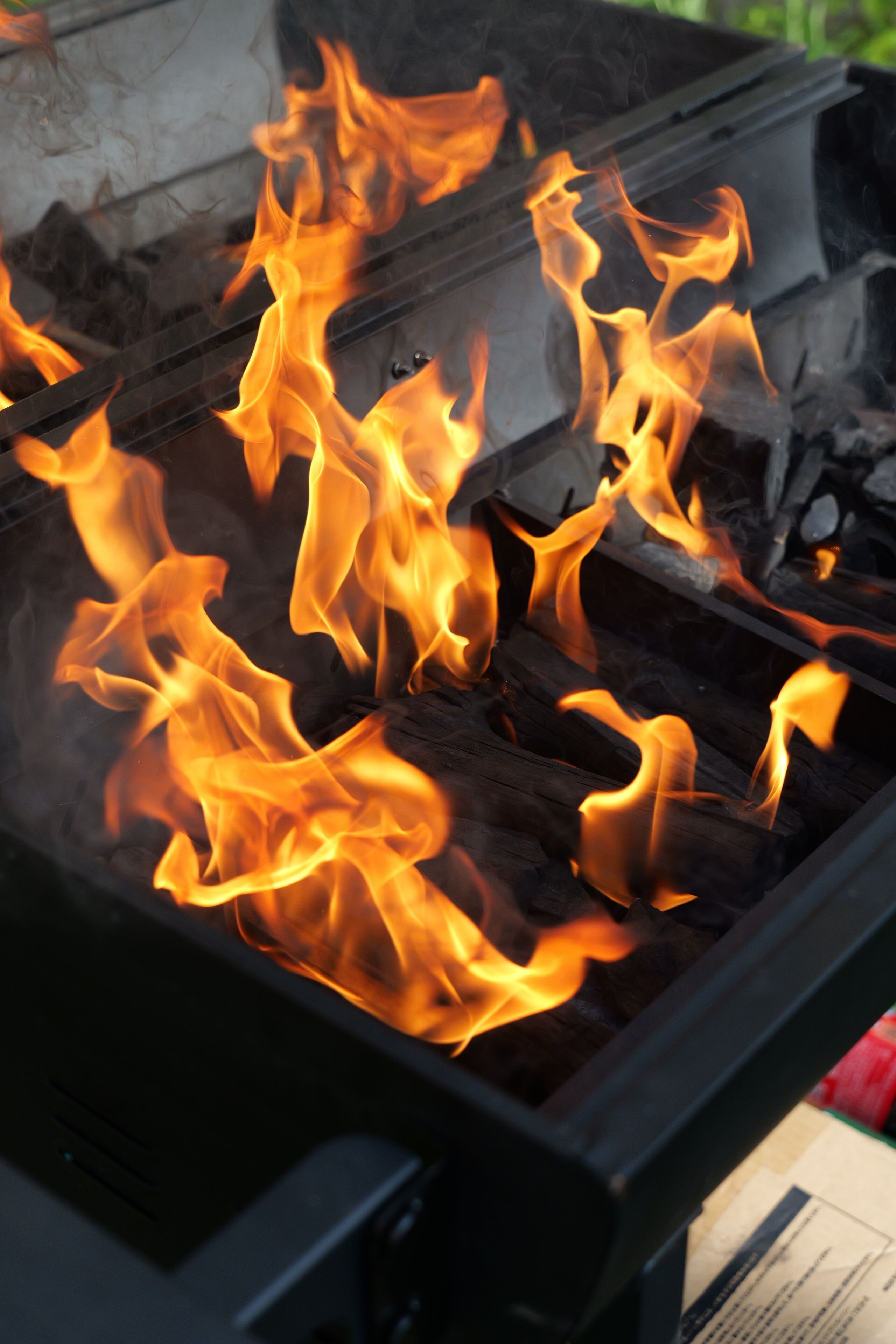 A grill with visible flames.