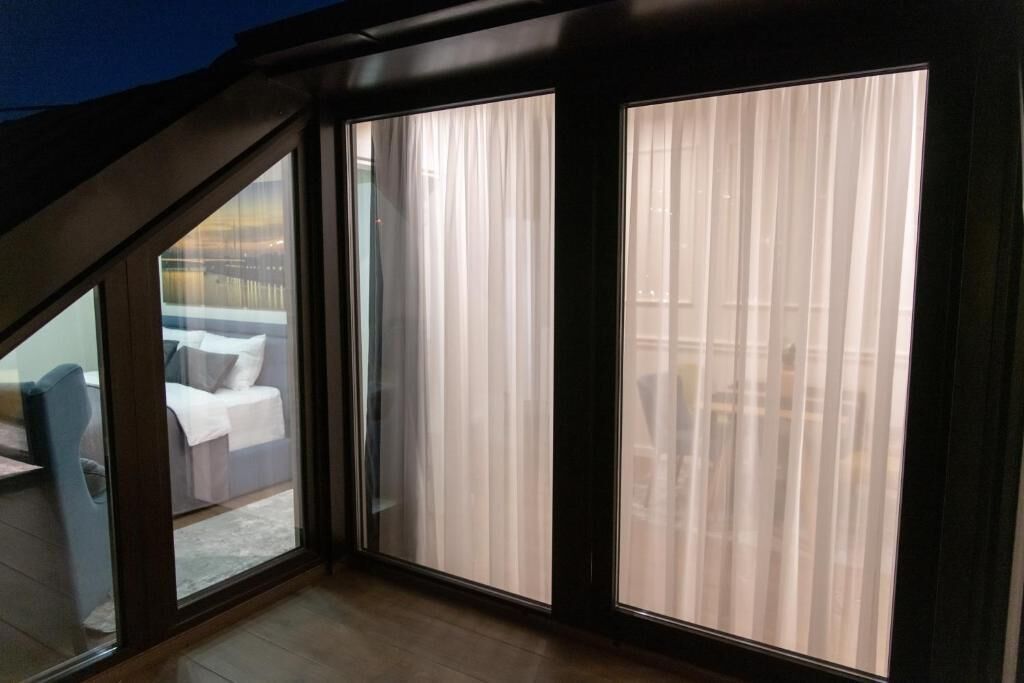 Familierom, balkong, byutsikt | Innvendig