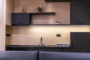 Loftsleilighet – deluxe, balkong, byutsikt | Eget kjøkken