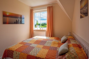 2 bedrooms, in-room safe, iron/ironing board, travel cot
