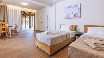 Basic Quadruple Room, Housekeeping, Pool View | In-room safe, soundproofing, free WiFi