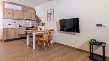 Senior Triple Room, Pool View | In-room safe, soundproofing, free WiFi