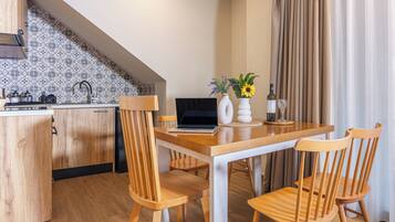 Basic Quadruple Room, Housekeeping, Pool View | Private kitchen