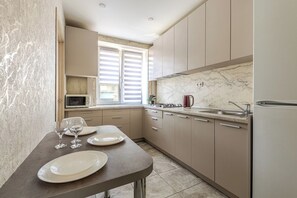 Comfort Condo | Private kitchen - StudioMinsk Romanovskaya Sloboda 12 (Minsk)