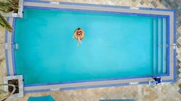 Outdoor pool, pool umbrellas, sun loungers