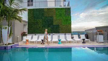 Outdoor pool, pool umbrellas, sun loungers