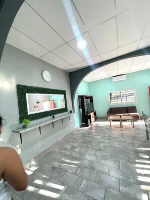 Living room - Peaceful Morales Getaway With 3 Spacious Bedrooms (Morales)