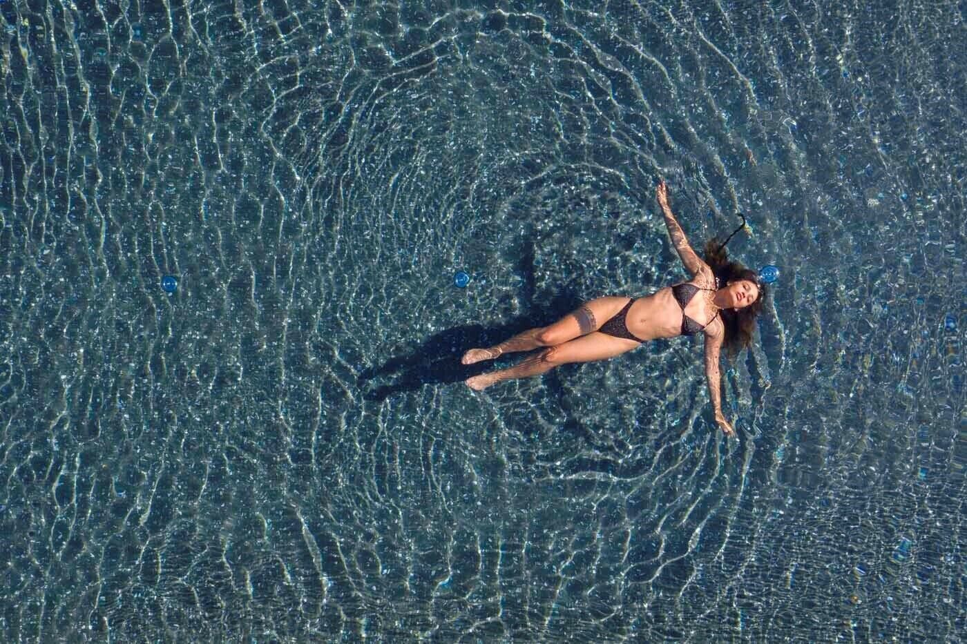 Seasonal outdoor pool, open 9:00 AM to 7:00 PM, pool umbrellas