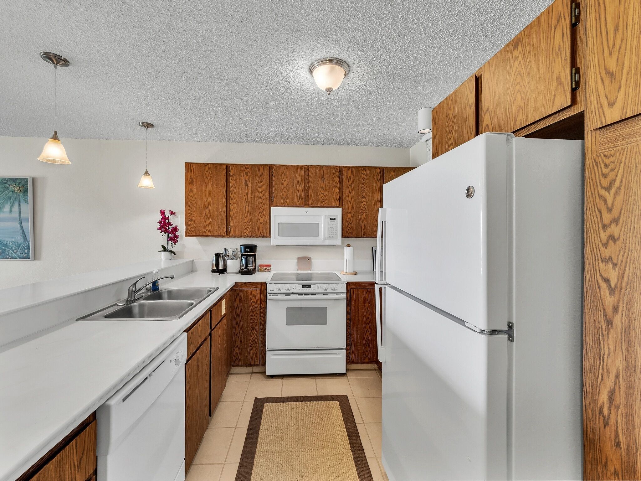 Condo, 2 Bedrooms | Private kitchen | Fridge, oven, coffee/tea maker, toaster