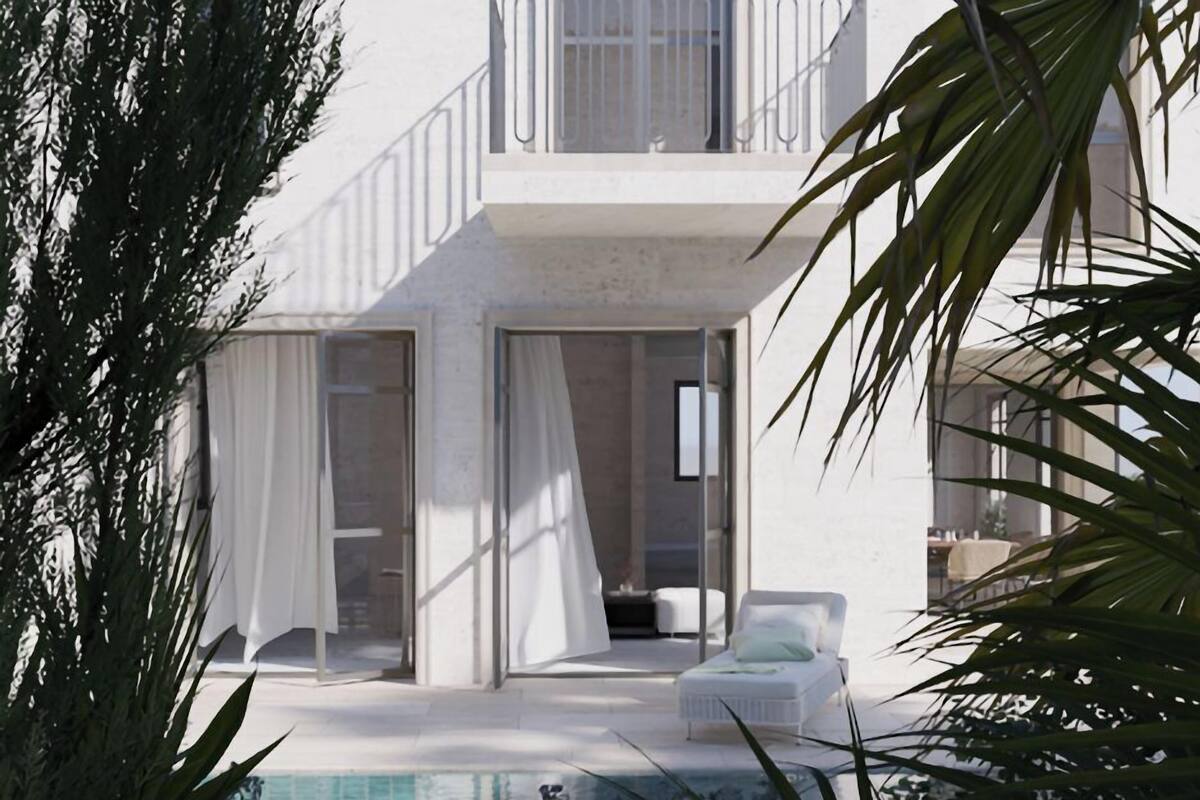 Une maison moderne dotée d’une piscine, d’un balcon et d’une grande fenêtre.