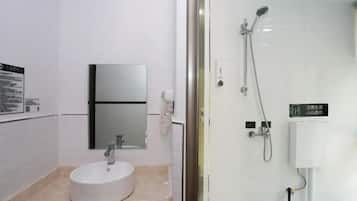 Superior Single Room | Bathroom | Hair dryer, slippers, shampoo, toilet paper
