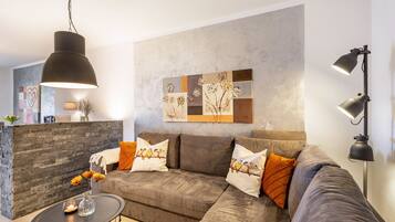 Televisión, chimenea, estéreo