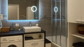 Shower, free toiletries, hair dryer, towels