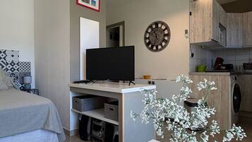 1 slaapkamer, een strijkplank/strijkijzer