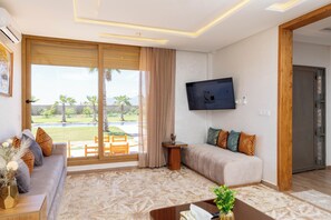 Vila luxo, vista para o jardim | Área de estar | Brinquedos