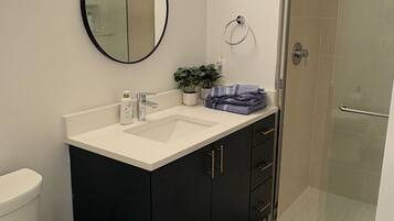 Hair dryer, towels, soap, toilet paper