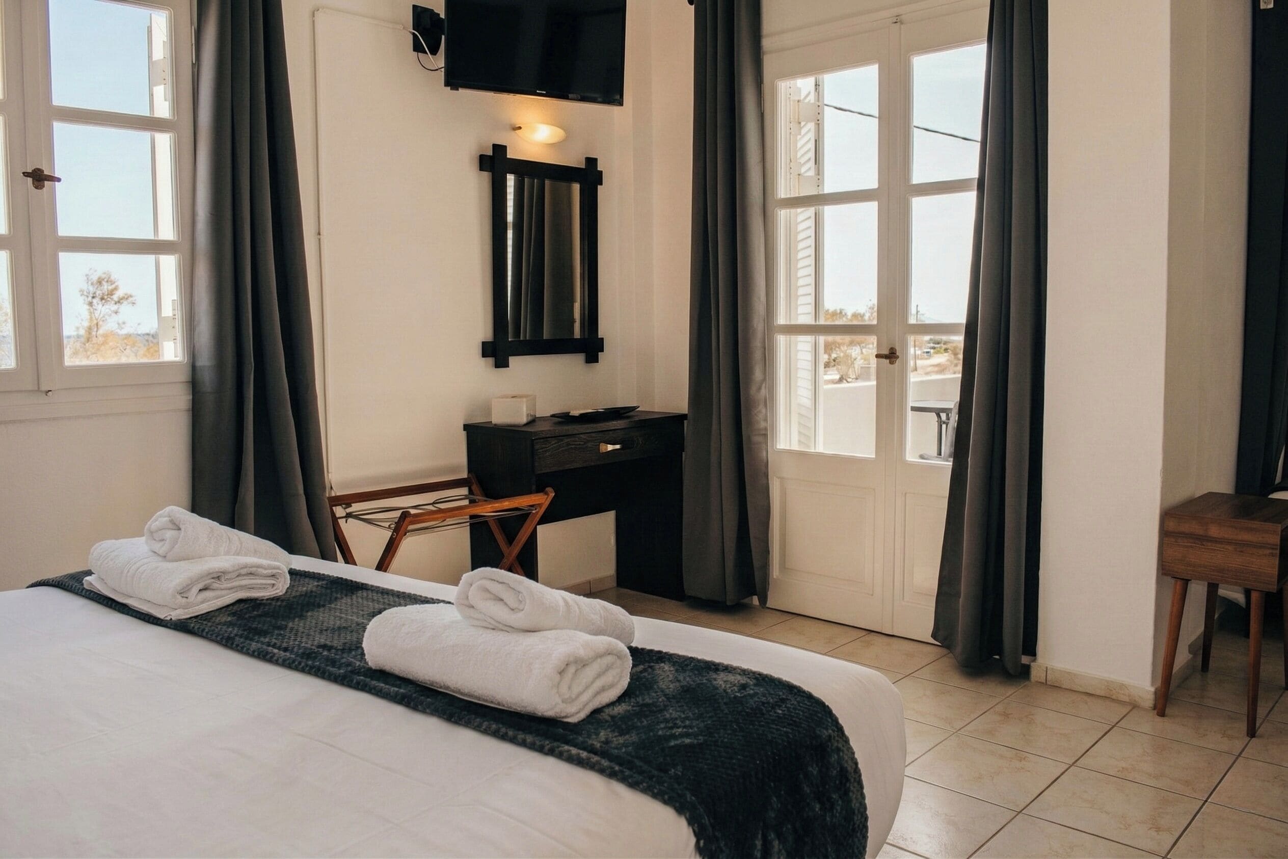 Classic Triple Room, Balcony, Ocean View | In-room safe, desk, laptop workspace, blackout drapes