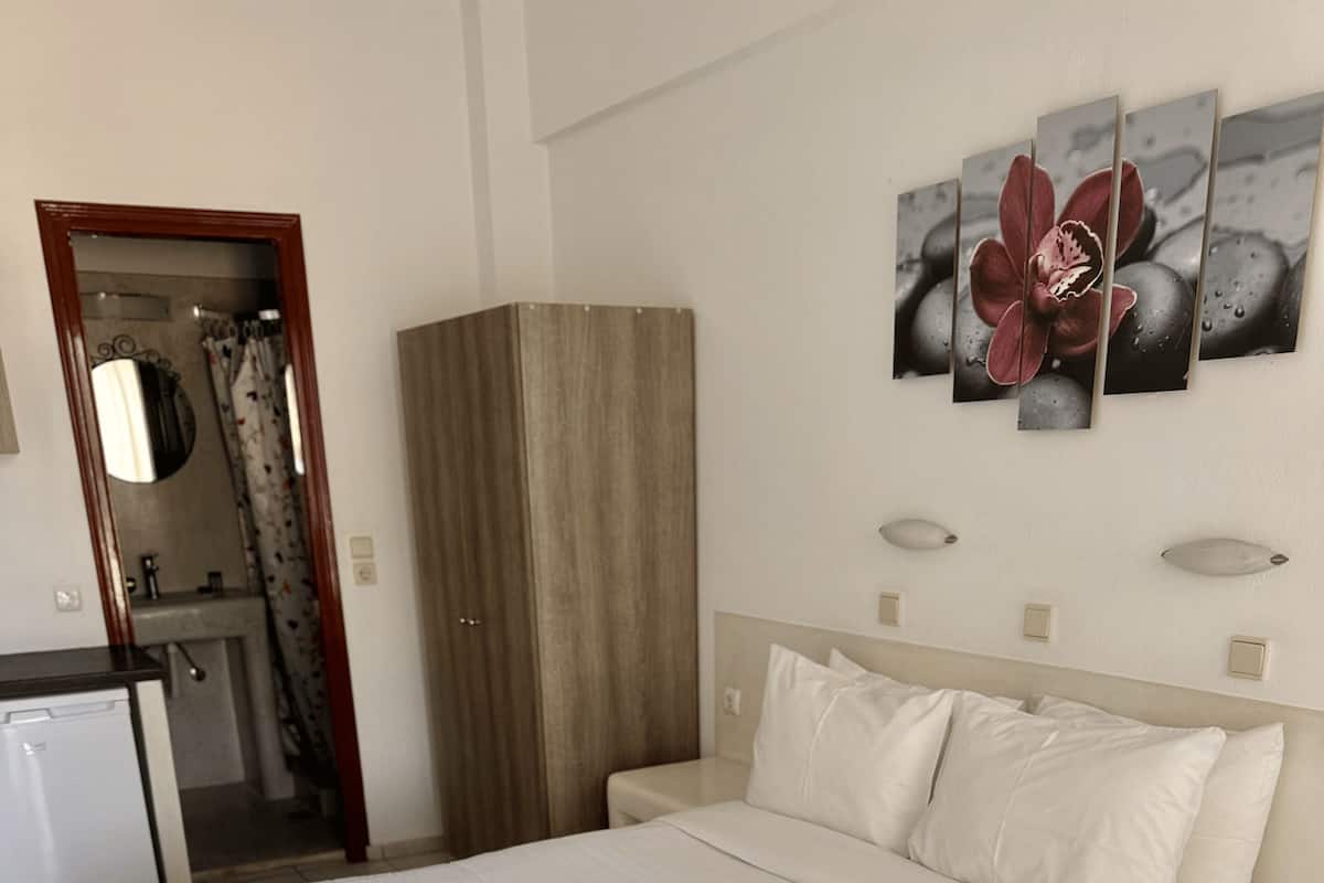 Classic Double Room, Balcony, Sea View | In-room safe, desk, laptop workspace, blackout drapes