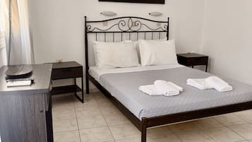 Basic Double Room, Balcony, Courtyard View | In-room safe, desk, laptop workspace, blackout curtains