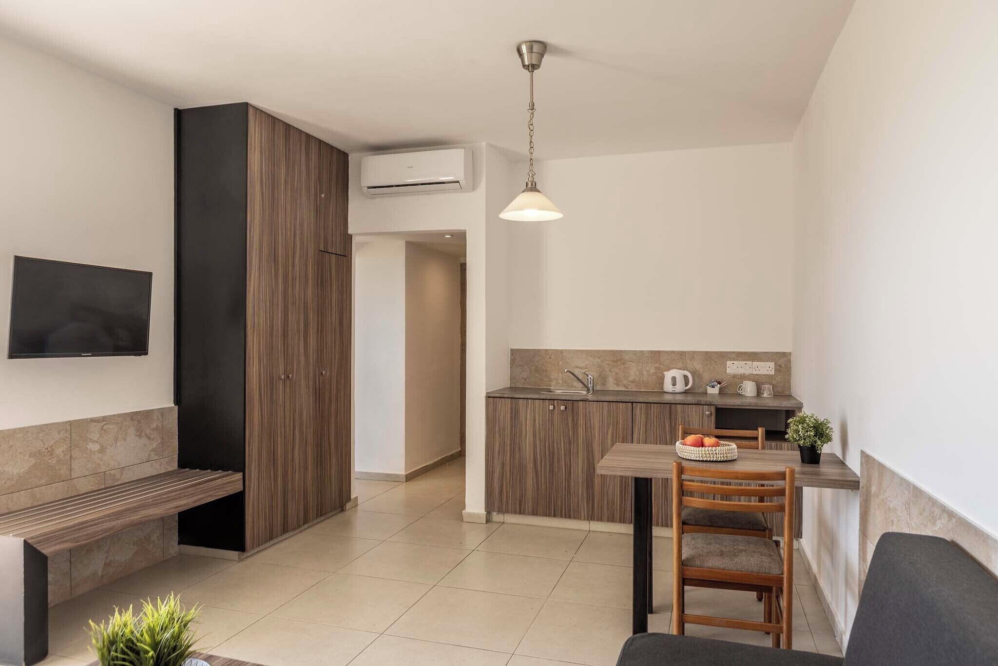 Suite, 1 chambre | Coin séjour
