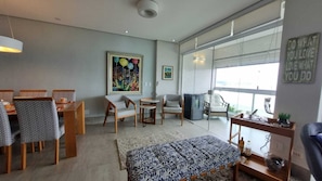 Living room - Condomínio Piquiú (Guarujá)