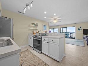 Fridge, microwave, oven, stovetop - Queen’s Court 2203 | Ocean Breeze Retreat (Emerald Isle)