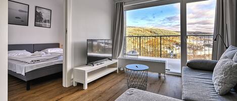 Apartment (34) | Living area | Flat-screen TV