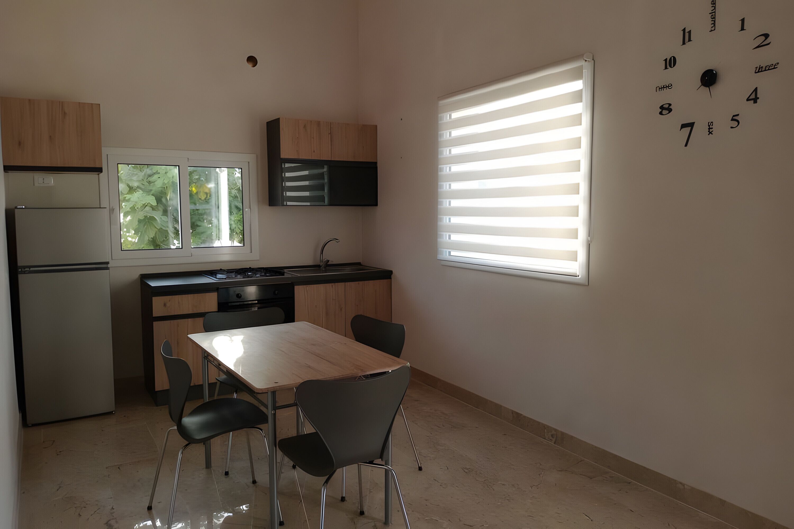 Fridge, stovetop, coffee/tea maker, cookware/dishes/utensils