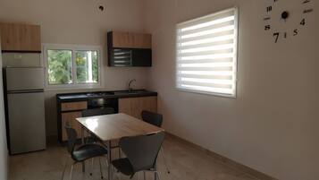 Fridge, stovetop, coffee/tea maker, cookware/dishes/utensils