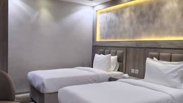 Egyptian cotton sheets, premium bedding, down duvets, in-room safe