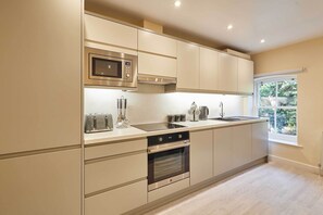 Fridge, microwave, oven, stovetop - Host & Stay | Ross's View, Second Floor, Apartment 4 (Whitby)