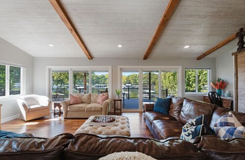 Lakefront, Private Dock, Boat Slip and Indoor Fishing.  Airport next door.