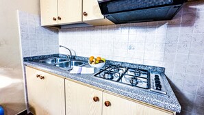 Superior Studio, Sea View | Living area - Residence Hotel La Pelosetta (Stintino)