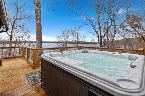 Welcome to Horizon Hideaway - our beautiful home offers easy access to Beaver Lake's shore and stunning views from sunroom, deck, and hot tub!
