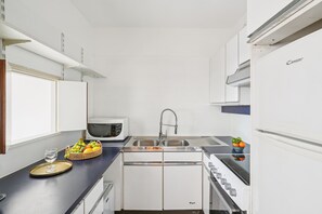 City Apartment, 1 Double Bed with Sofa bed, Non Smoking, Garden View | Private kitchen | Espresso maker, coffee/tea maker, electric kettle, toaster - Chic 1BR Steps from Opéra Garnier (Paris)