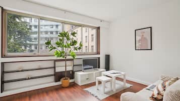 City Apartment, 1 Double Bed with Sofa bed, Non Smoking, Garden View | Living area | 40-inch Smart TV with satellite channels