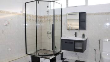 Shower, hair dryer, towels, soap