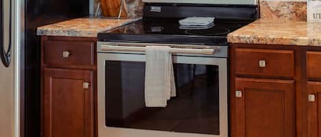 Coffee/tea maker, fridge, microwave, oven