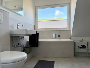 Eco-friendly toiletries, hair dryer, towels, soap