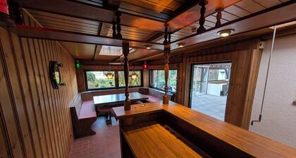 Cozy house with party basement and garden in quiet location near the trade fair!