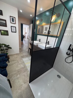 Shower, hair dryer, towels, soap