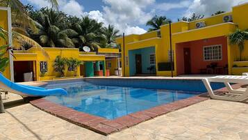 2 outdoor pools, open 6:00 AM to 10:00 PM, pool loungers