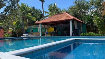 2 outdoor pools, open 6:00 AM to 10:00 PM, pool loungers
