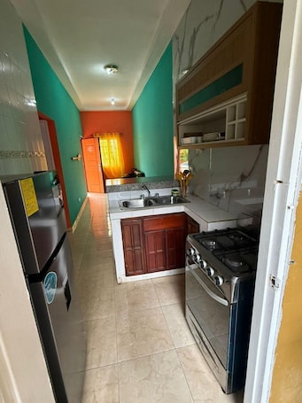 Family Double Room, Patio | Private kitchen