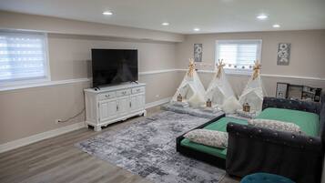 Iron/ironing board, travel crib, free WiFi, bed sheets