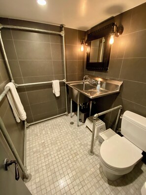 A modern bathroom with a walk-in shower, a sink, and a toilet. - Prospect Park Escape (Brooklyn)