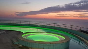 Seasonal outdoor pool, pool umbrellas, pool loungers