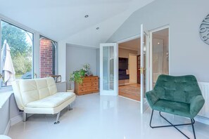 TV, fireplace - Sutherland House • Modern & Elegant Home - Pass the Keys (Telford)