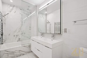 Shower, hair dryer, towels - 132 W 26 - 6 Modern 2BR with WD in Elevator Building in NoMad (New York)